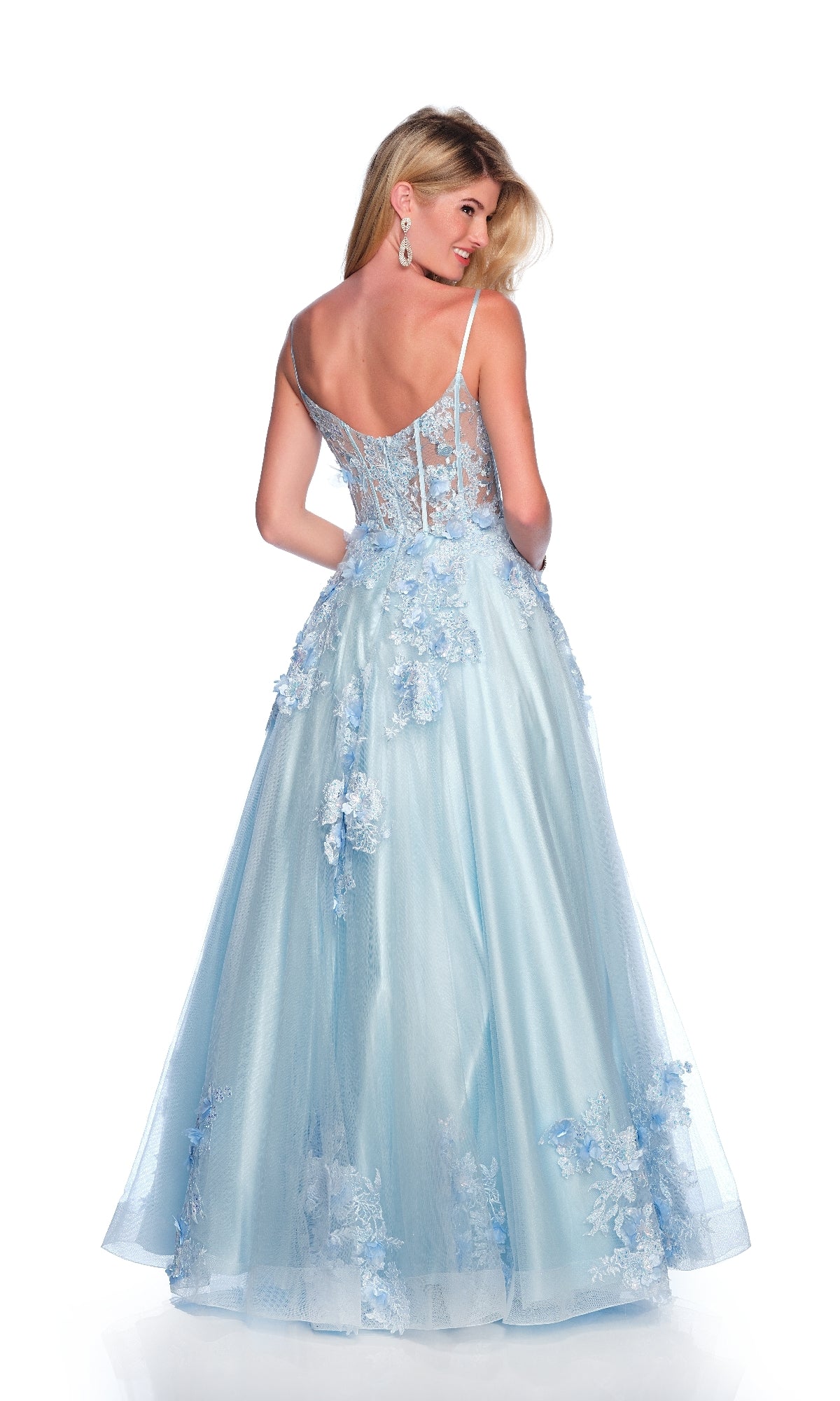 Woman wearing the Dave & Johnny 11801 long light blue prom dress with 3D flower accents and a sheer lace back, standing and looking over her shoulder.